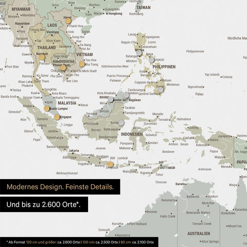 Détail d'une carte du monde magnétique multicolore Sage montrant la carte de l'Asie, où des aimants marquent des destinations de voyage