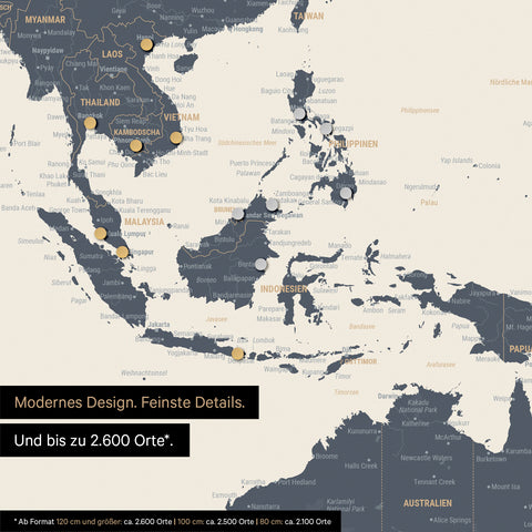 Détail d'une carte du monde magnétique multicolore Navy Light montrant la carte de l'Asie, où des aimants marquent des destinations de voyage