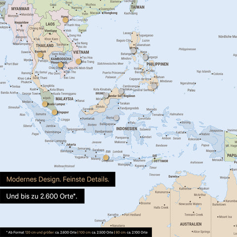 Détail d'une carte du monde magnétique multicolore Atlas montrant la carte de l'Asie, où des aimants marquent des destinations de voyage