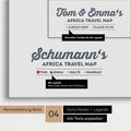Pinnwand Leinwand einer Afrika-Karte in Denim Blue mit Personalisierung als Logo mit Familiennamen und Legende
