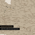 Detail einer Österreich-Karte als Pinn-Leinand in Desert Sand mit Pins im Salzburger Land und Kärnten