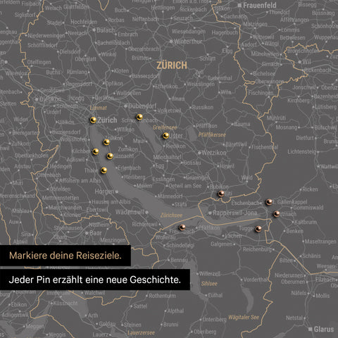Detail einer Schweiz-Karte als Pinn-Leinwand in Dunkelgrau mit Pins rund um Zürich