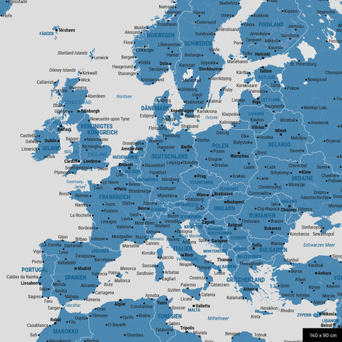 A detailed section of a blue world map pinboard shows a section of Europe with all countries and capitals.