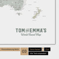 World map in multicolor sage with a vintage logo as modern personalization